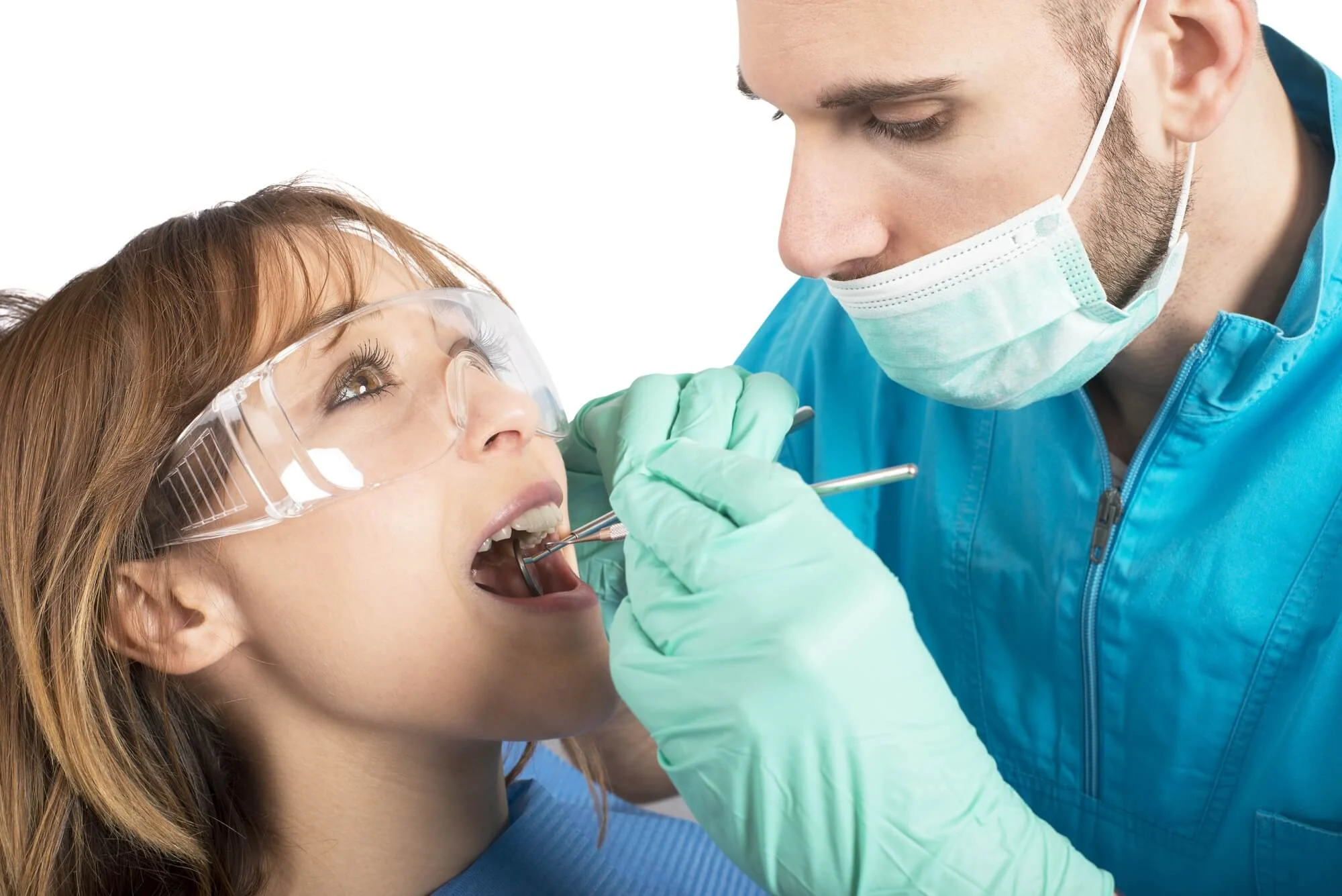montgomery dentist checks patient's teeth