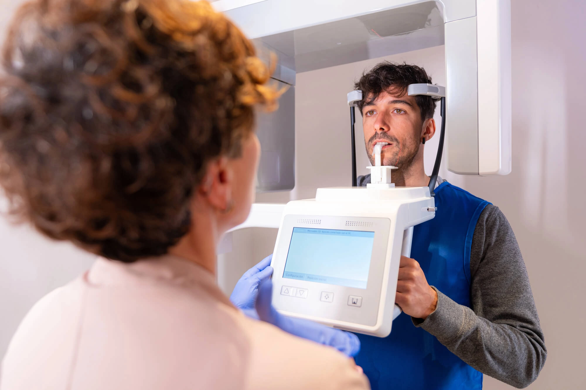 Man undergoing scanning with advanced dental care montgomery al